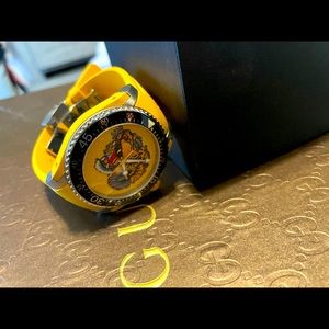 Yellow Gucci watch